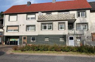 Haus kaufen in 36217 Ronshausen, Gepflegtes Zweifamilienhaus mit Scheune in zentraler Lage von Ronshausen!