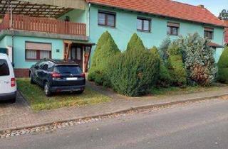 Haus kaufen in 99820 Hörselberg-Hainich, Zweifamilienhaus mit überdachter Terrasse