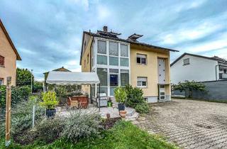 Mehrfamilienhaus kaufen in 76437 Rastatt, Kapitalanlage: Mehrfamilienhaus mit 3 Wohnungen, Garten und Garagen