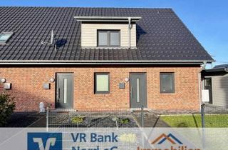 Doppelhaushälfte kaufen in 25821 Bredstedt, Doppelhaushälfte als Renditeobjekt: Zwei vermietete Einheiten für stabile Erträge