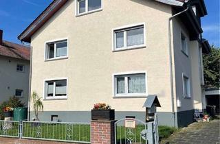 Haus kaufen in 61130 Nidderau, Zweifamilienhaus inkl. Baugrundstück in ruhiger Lage nahe des Felds