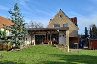 Doppelhaushälfte kaufen in 32052 Herford, Pfiffige Doppelhaushälfte mit parkähnlichem Garten