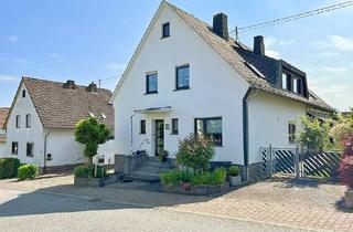 Haus kaufen in 56424 Mogendorf, 1-2 Familienhaus mit zwei Garagen und schönem Grundstück