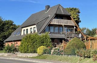Mehrfamilienhaus kaufen in 25764 Schülp, Mehrfamilienhaus im Ortszentrum
