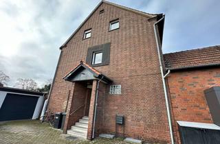 Mehrfamilienhaus kaufen in 46514 Schermbeck, Vermietetes Mehrfamilienhaus mit separaten Gärten sowie zwei Garagen in Sackgassenlage!