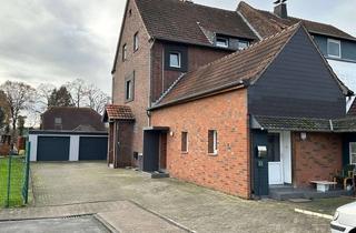 Mehrfamilienhaus kaufen in 46514 Schermbeck, Vermietetes Mehrfamilienhaus mit separaten Gärten sowie zwei Garagen in Sackgassenlage!