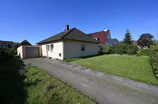 Haus kaufen in 26180 Rastede, Kompaktes Wohnhaus auf großem Grundstück in Rastede / Wahnbek