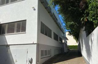 Gewerbeimmobilie kaufen in 65824 Schwalbach, Bürogebäude in zentraler Lage