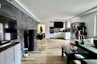 Wohnung kaufen in 72574 Bad Urach, Schöne kernsarnierte Zwei Zimmerwohnung in zentraler Lage