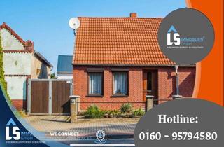 Doppelhaushälfte kaufen in 39576 Uenglingen, Doppelhaushälfte in Uenglingen mit tollem Grundstück und Nebengelass