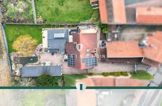 Anlageobjekt in 67283 Obrigheim (Pfalz), Großzügiges Einfamilienhaus mit drei zusätzlichen Wohneinheiten, weitläufigem Garten und Indoorpool