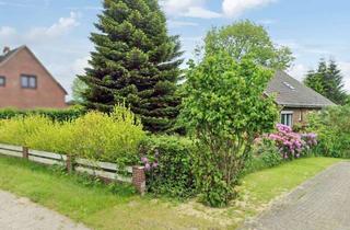 Einfamilienhaus kaufen in 25712 Buchholz, Familiengerechtes Einfamilienhaus mit Einliegerwohnung und großem Garten