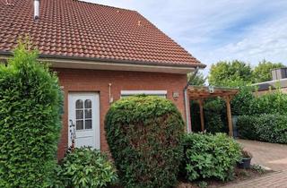 Haus kaufen in 26676 Barßel, Objekt 23/023 attraktive Immobilie m. Garage u. Carport im Ortskern im Seemannsort Barßel