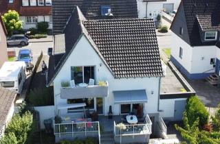 Haus kaufen in 58708 Menden (Sauerland), Modernisiertes Zweifamilienhaus mit großem Grundstück im Herzen von Platte Heide