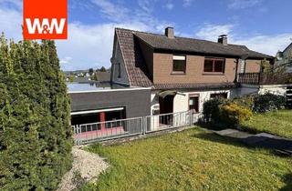 Doppelhaushälfte kaufen in 35236 Breidenbach, Geräumige Doppelhaushälfte in Breidenbach mit Garage und Garten