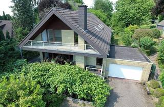Haus kaufen in 51519 Odenthal / Glöbusch, Odenthal / Glöbusch - Exklusives Dreifamilienhaus mit Schwimmbad und Doppelgarage in Odenthal-Glöbusch