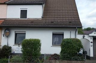 Doppelhaushälfte kaufen in 61137 Schöneck, Schöneck - Gemütliche DHH mit Anbau, Garage, Garten und Stellplatz
