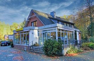 Haus kaufen in 28816 Stuhr, Stuhr - Vermietetes Wohn- und Geschäftshaus in zentraler Lage von Stuhr-Heiligenrode !