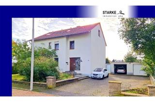 Mehrfamilienhaus kaufen in 32584 Löhne, Löhne - 3-Familienhaus in Löhne auf großem Grundstück mit zwei Garagen
