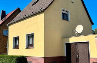 Einfamilienhaus kaufen in 06800 Raguhn-Jeßnitz, Raguhn-Jeßnitz - Ruhig gelegenes Einfamilienhaus mit Garage und Garten Jeßnitz