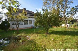 Haus kaufen in 63811 Stockstadt, Stockstadt - Vermietetes Wohnhaus mit großem Garten in bevorzugter Lage