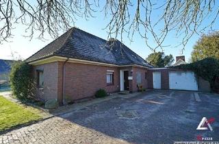 Haus kaufen in 26670 Uplengen, Uplengen - Wohnhaus mit großzügigem Grundstück in zentrumsnaher Wohnlage!
