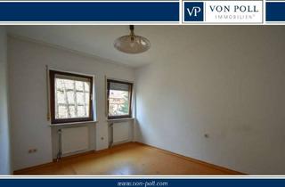 Wohnung kaufen in 97318 Kitzingen, Charmante Vier-Zimmer-Wohnung mit Kachelofen und Einbauküche in Repperndorf