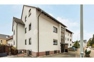 Wohnung kaufen in 65824 Schwalbach am Taunus, Gepflegte Hochparterre-Wohnung mit SW-Balkon, Garage und Garten