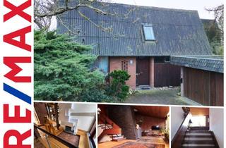 Haus kaufen in 47551 Bedburg-Hau, außergewöhnliches Architektenhaus mit Einliegerwohnung in sehr schöner und ruhiger Wohnlage