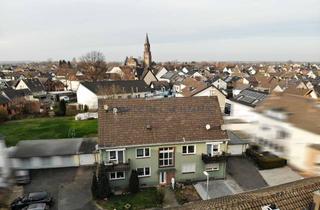 Haus kaufen in 53844 Troisdorf, Troisdorf Bergheim – Das lohnt sich! 5 Parteienhaus mit 3 Garagen, 2 Stellplätzen u. Ausbaupotential
