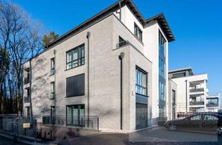 Wohnung kaufen in 26871 Papenburg, Neuwertige Erdgeschosswohnung in guter Lage mit Sommergarten und Tiefgaragenstellplatz