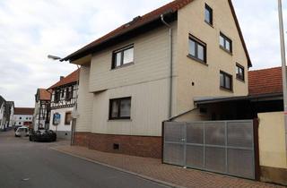 Haus kaufen in 64354 Reinheim, **VISTA Immobilien** Zwei-Familienhaus mit Ladenfläche, Innenhof und Garage