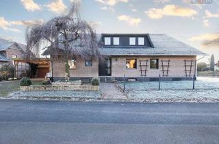 Haus kaufen in 49419 Wagenfeld, Geräumiges Ein- bis Zweifamilienhaus in ruhiger Lage bietet großes Potenzial zum selbst gestalten!