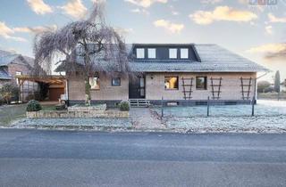 Haus kaufen in 49419 Wagenfeld, Wagenfeld - Geräumiges Ein- bis Zweifamilienhaus in ruhiger Lage bietet großes Potenzial zum selbst gestalten!