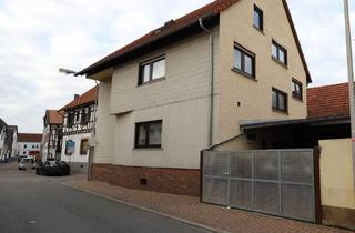 Haus kaufen in 64354 Reinheim / Spachbrücken, Reinheim / Spachbrücken - **VISTA Immobilien** Zwei-Familienhaus mit Ladenfläche, Innenhof und Garage