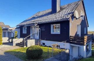 Einfamilienhaus kaufen in 34508 Willingen, Willingen (Upland)-Usseln - Hochinteressant: Wohnhaus aufgeteilt in drei Wohnungen mit Terrassen und Doppelgarage in sonniger Ferienlage Willingen-Usseln