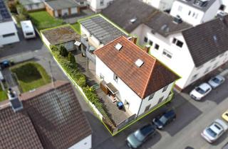 Einfamilienhaus kaufen in 63329 Egelsbach, ZENTRALES WOHNVERGNÜGEN - Charmantes Einfamilienhaus mit Garage, Innenhof und Einliegerwohnung