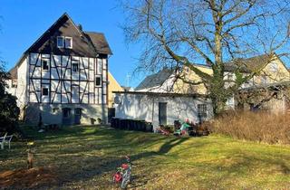 Mehrfamilienhaus kaufen in 35684 Dillenburg, Schönes Mehrfamilienhaus inklusive großem Baugrundstück!