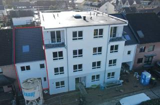 Wohnung kaufen in 41540 Dormagen / Delhoven, Dormagen / Delhoven - Maisonette-Wohnung mit Reihenhaus-Charakter