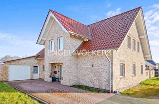 Einfamilienhaus kaufen in 26524 Hage, Hage: Neuwertiges Einfamilienhaus mit Gartenteich