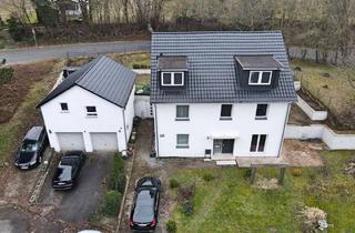Haus kaufen in 34253 Lohfelden, Lohfelden - Modernisiertes 3-Familienhaus mit zusätzlicher Einliegerwohnung!