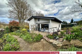 Haus kaufen in 55442 Stromberg, Naturidylle: Gepflegter Bungalow mit Garten und Garage in Luftkurort