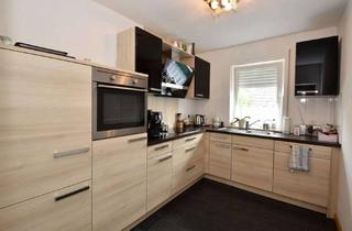 Wohnung kaufen in 26871 Papenburg, Oberwohnung mit separaten Gartenanteil, Balkon, Einbauküche und Ausbaureserve!