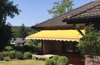 Haus kaufen in 57518 Betzdorf, Attraktiver Walmdach-Bungalow in idyllischer Gartenlandschaft