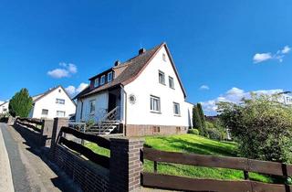 Haus kaufen in 31028 Gronau (Leine), Charmantes Zweifamilienhaus auf großzügigem Grundstück mit Garage in Gronau (Leine)