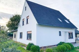 Haus kaufen in 27249 Mellinghausen, Gepflegtes Zweifamilienhaus in ruhiger Lage von Mellinghausen