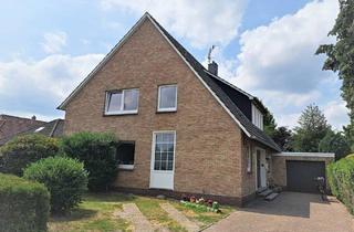 Haus kaufen in 26655 Westerstede, Westerstede - Attraktives Zweifamilienhaus mit Garage in Siedlungslage von Westerstede !