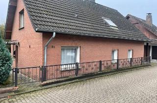 Haus kaufen in 46483 Wesel, Wesel - Modernisiertes freistehendes Ein-Zweifamilienhaus mit Wärmepumpe