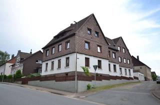Mehrfamilienhaus kaufen in Mühlenbergstraße, 37632 Eschershausen, Mehrfamilienhaus mit 7 WE, Werkstattgebäude und 3 Garagen