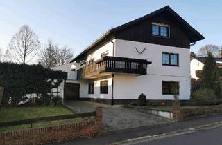 Haus kaufen in 35321 Laubach, Laubach - 1-Familienhaus mit Einliegerwohnung in Laubach
